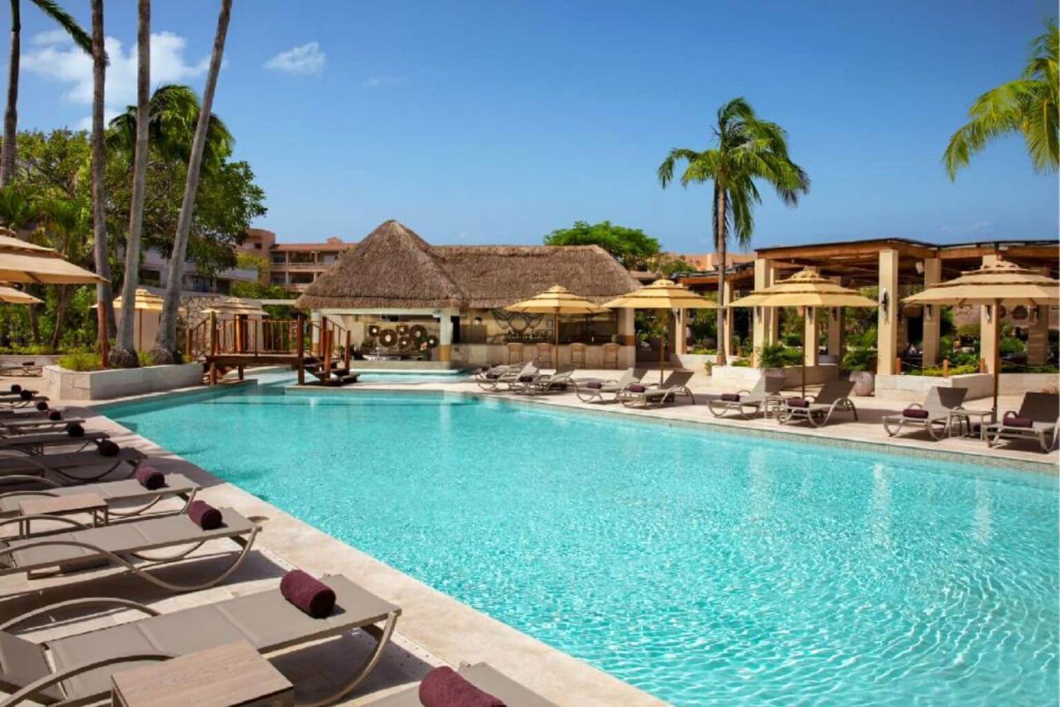 Pool and swim up bar inside Dreams Puerto Aventuras Resort and Spa