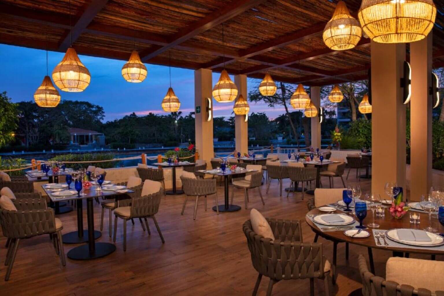 Evening dinning overlooking the marina at Dreams Puerto Aventuras Resort and Spa