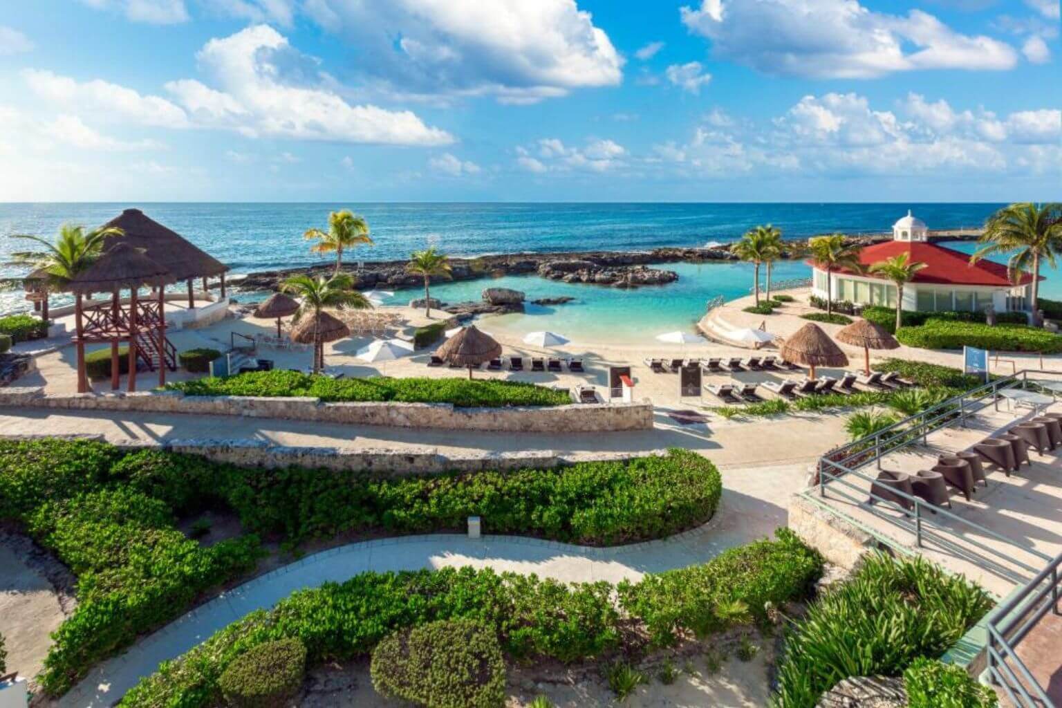 Beautiful grounds and beach at the ocean. Hard Rock Riviera Maya Hacienda Hotel.