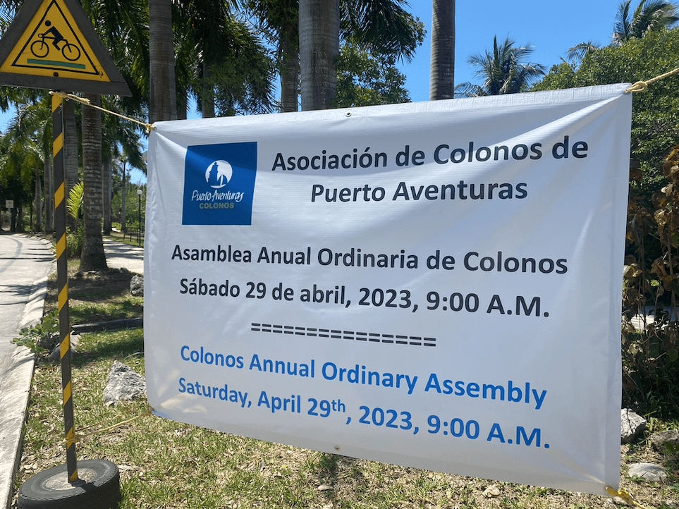 Sign for the Colonos Ordinary Assembly April 2023 in Puerto Aventuras