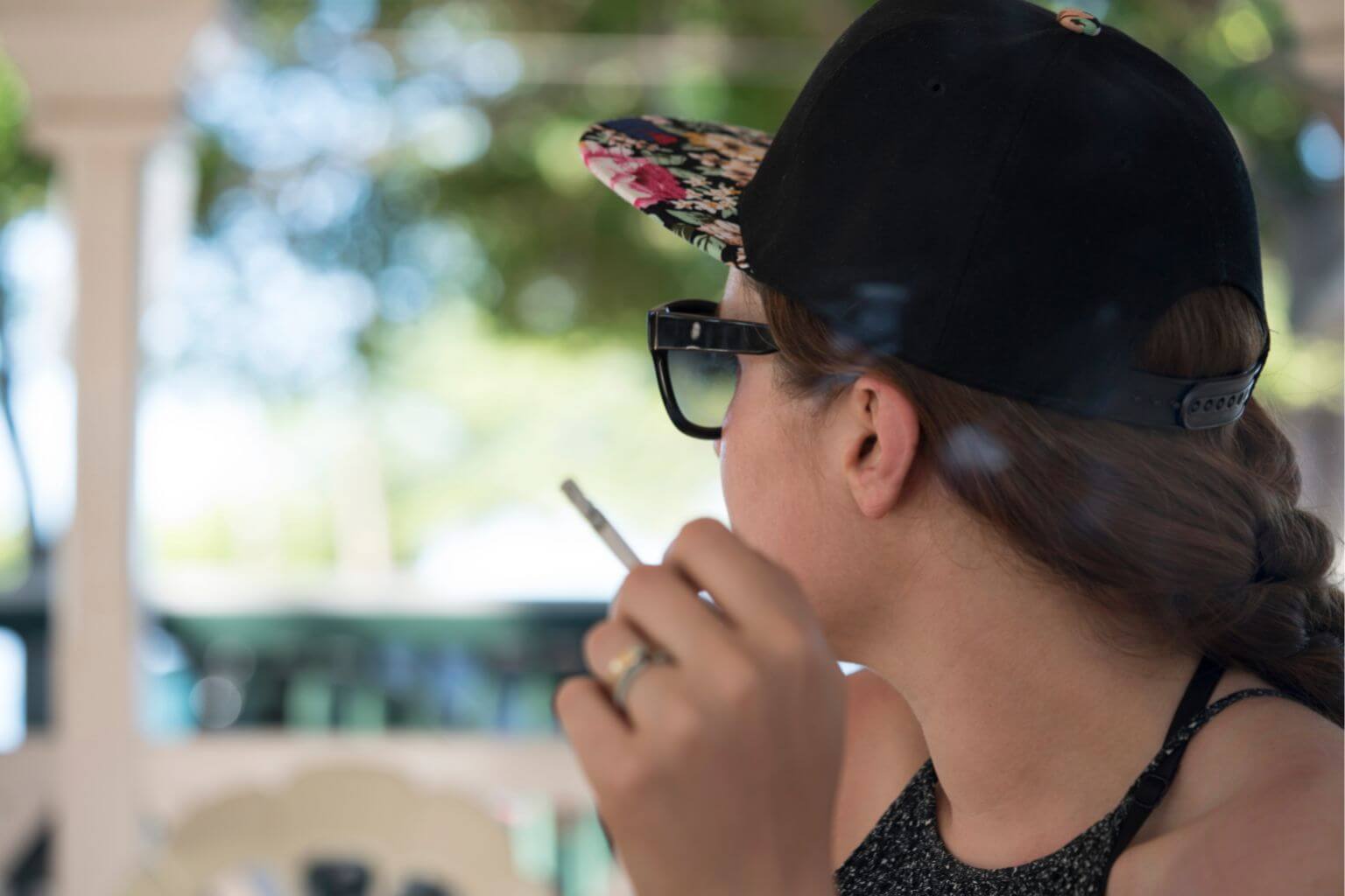 Woman smoking on vacation in Mexico