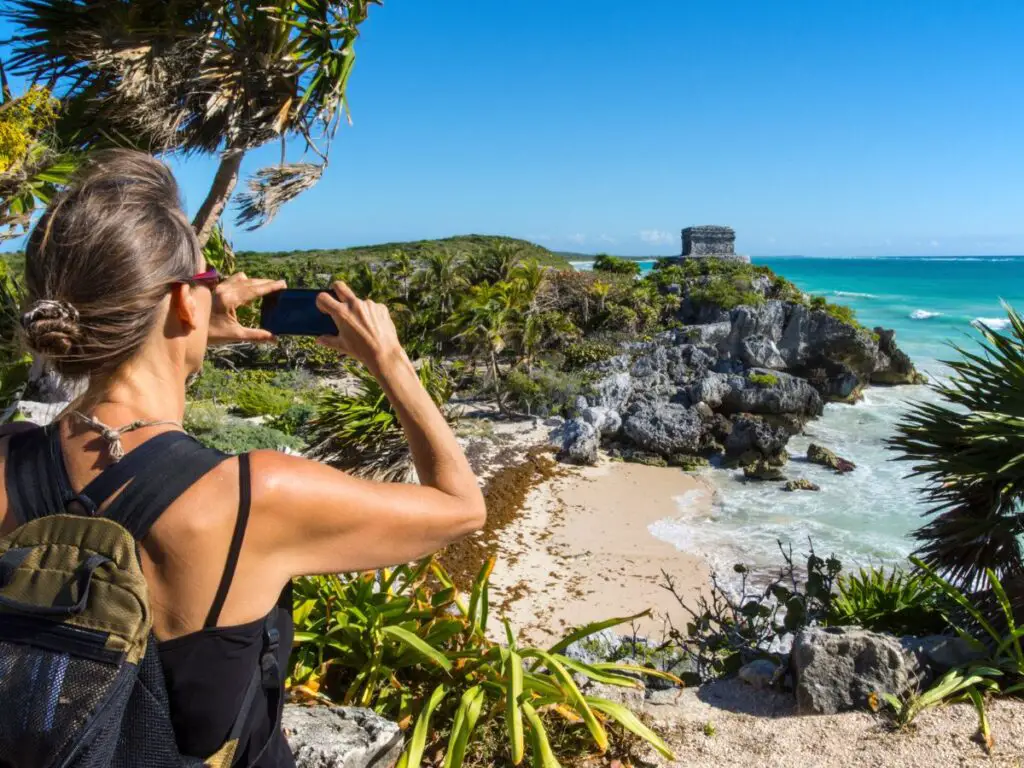 Taking a photo of the ruins at Tulum
