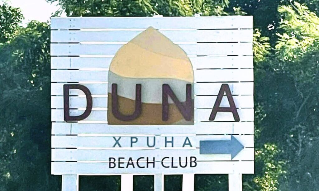 DUNA Beach Club Entrance Sign on 307