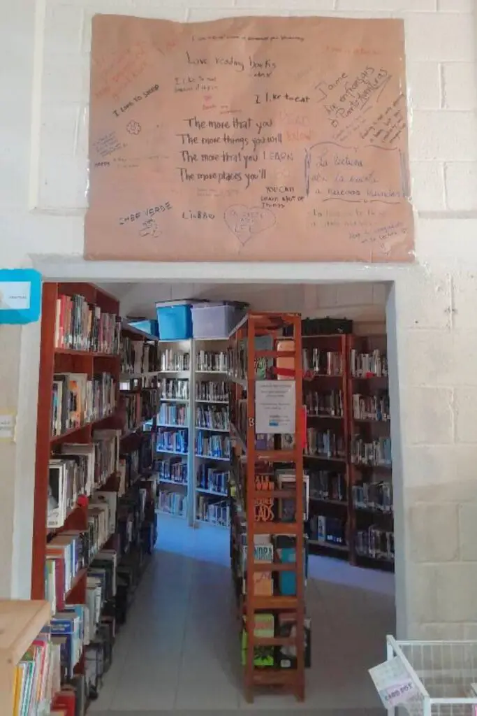 books in stacks at the puerto aventuras library