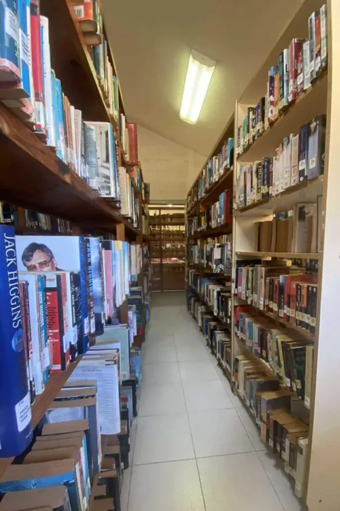 books in stacks at the puerto aventuras library